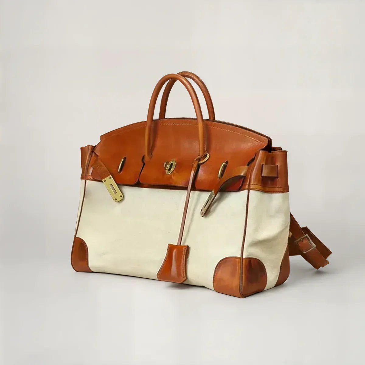 Damen Reisetasche aus Leder und Canvas mit Goldbeschlägen
