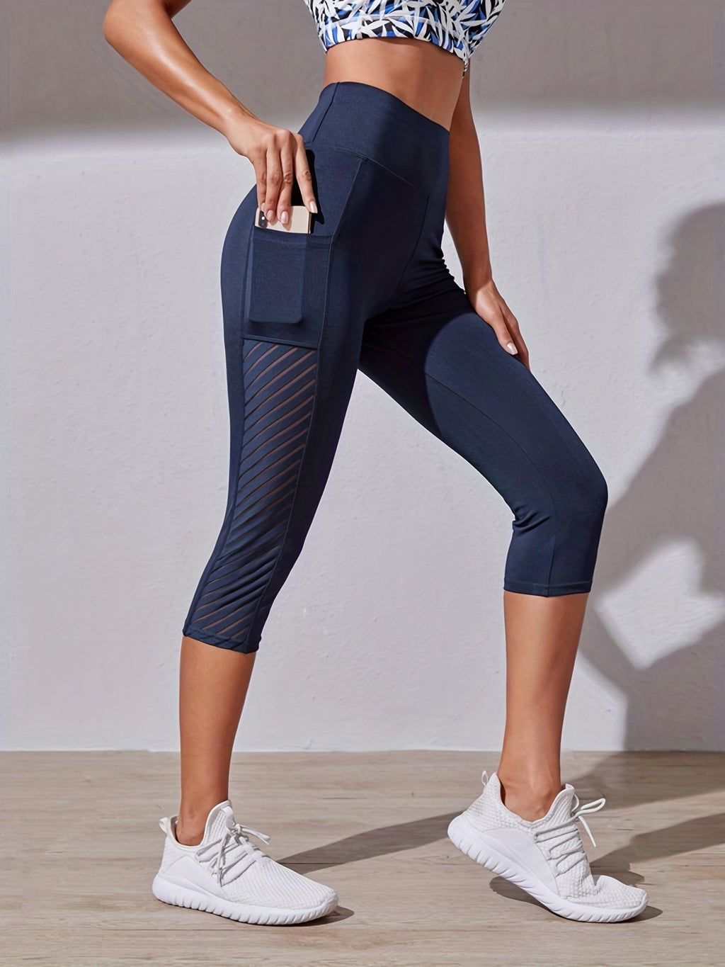 Damen Sportleggings mit Mesh-Einsatz