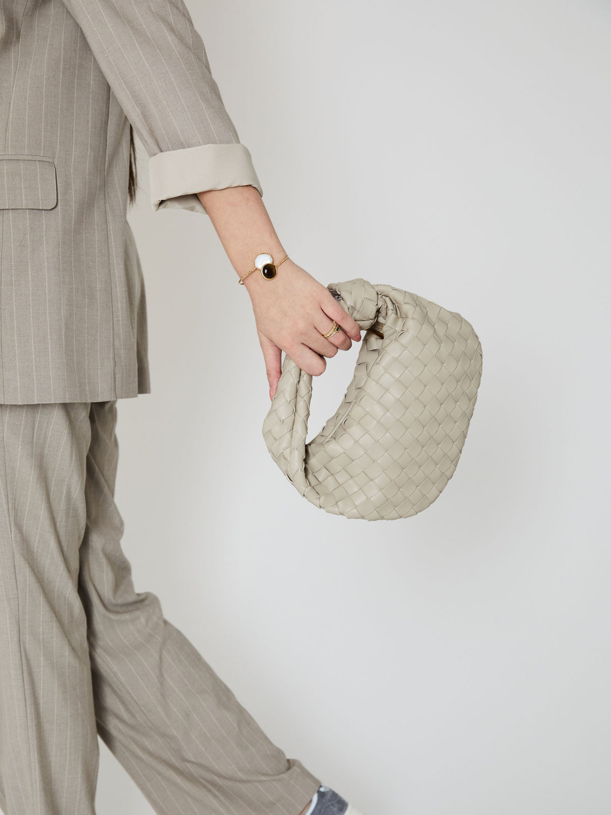Damen Geflochtene Mini-Handtasche aus Kunstleder mit Knotengriff